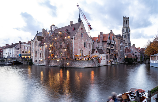 Famous place in Bruges Christmas lights decorations  city canal Belgium Europe