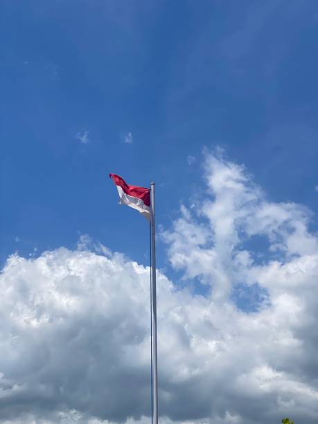istock Blue sky and Indonesian flag 1477191042