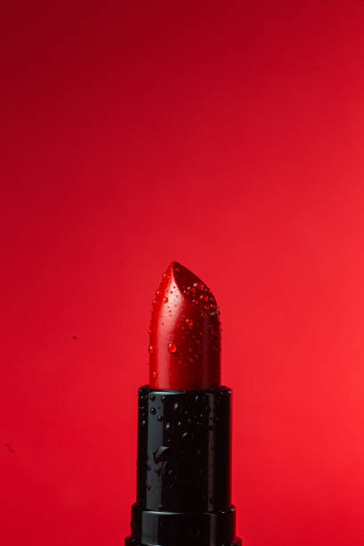 istock Moisturizing red lipstick close-up with water drops 1477191573