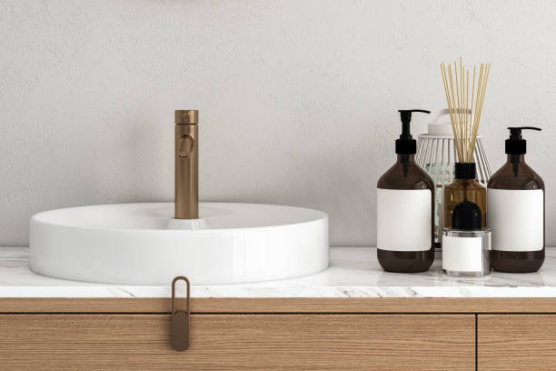 istock 3D render close up white vanity counter with ceramic washbasin and modern style faucet in a bathroom with morning sunlight and shadow. Blank space for products display mockup. Background. 1477191756