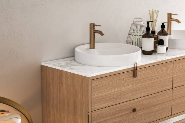 istock 3D render close up white vanity counter with ceramic washbasin and modern style faucet in a bathroom with morning sunlight and shadow. Blank space for products display mockup. Background. 1477192755