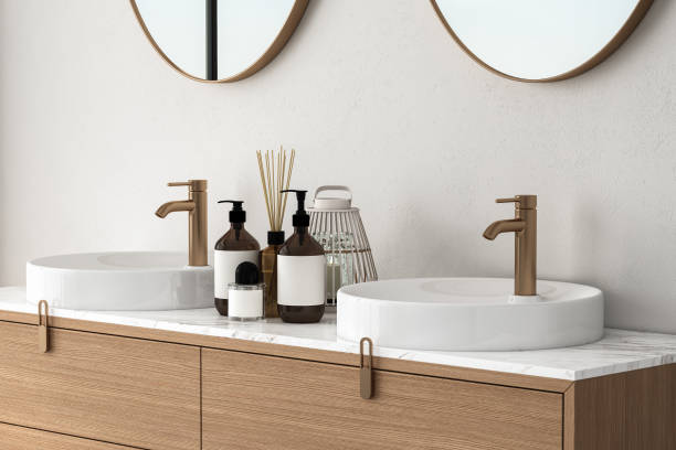 istock 3D render close up white vanity counter with ceramic washbasin and modern style faucet in a bathroom with morning sunlight and shadow. Blank space for products display mockup. Background. 1477192854