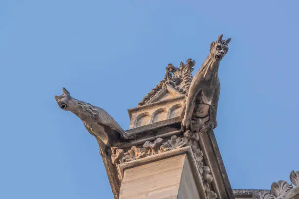 Paris, France - Dec. 27 2022: The Gothic style Gargoyle on the roof of Saint-Chapelle in Paris