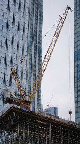 Crane for the construction of office buildings stock photo