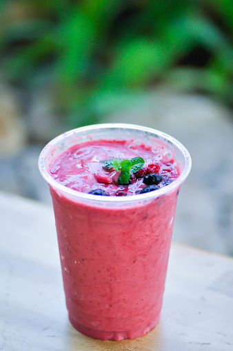 strawberry yogurt smoothie, mixed berry smoothieor berry smoothie with berry topping