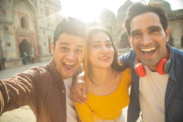 istock Group of friends taking selfie at historic site 1477197801
