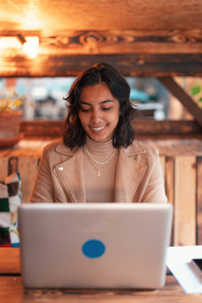 istock freelance indian young woman working with laptop 1477201883
