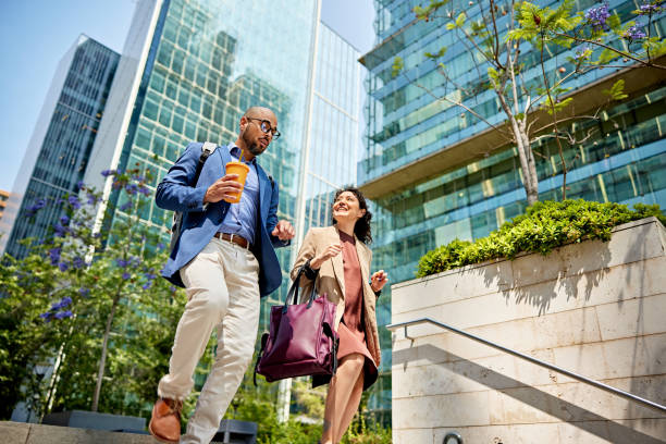 istock Corporate colleagues outdoors in downtown district 1477202512