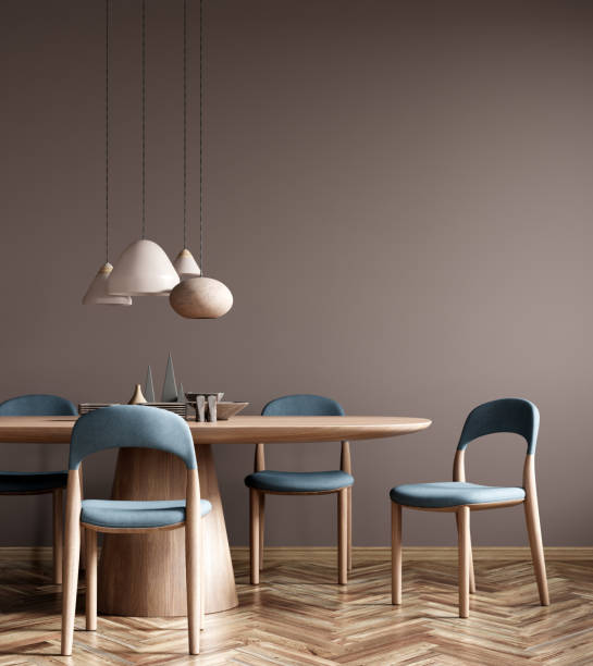 istock Interior of modern dining room, dining table and blue fabric chairs against beige wall. 3d rendering 1477203707