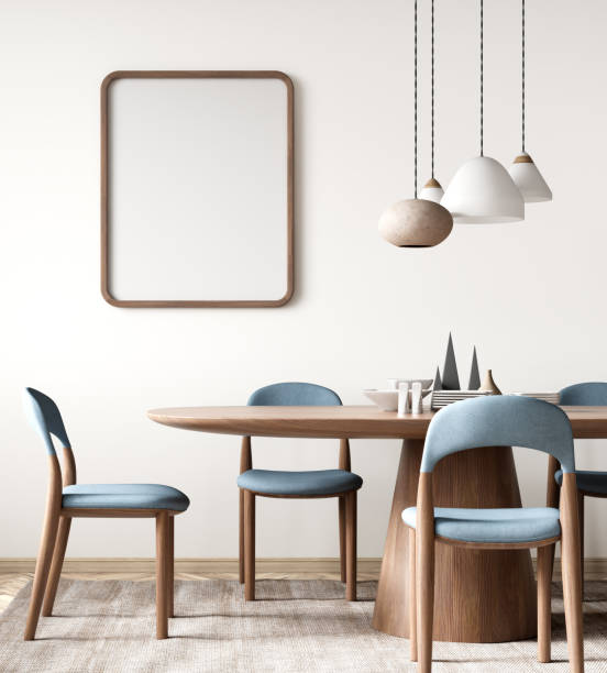 istock Interior of modern dining room, dining table and chairs against white wall with empty frame. 3d rendering 1477203976