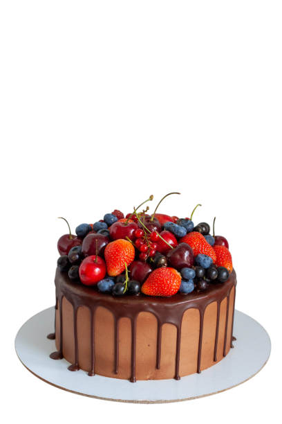 istock Chocolate cake with fresh berries, strawberry, cherry, blueberry isolated on white background. Vertical orientation 1477204247