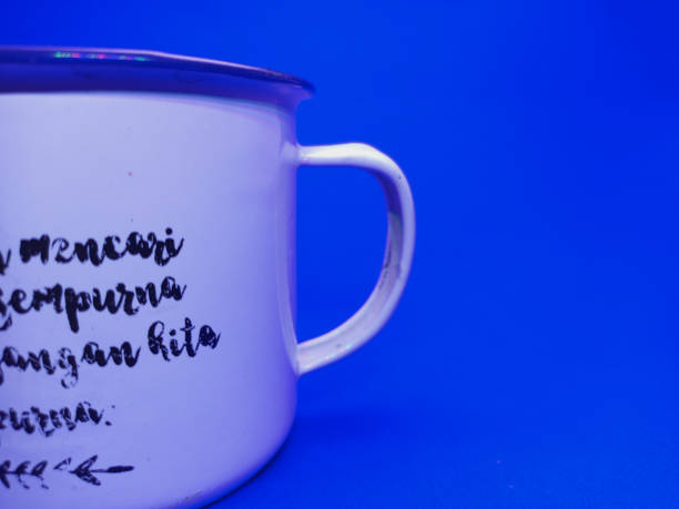 istock white cup for coffee and tea with flower texture and font 1477206108