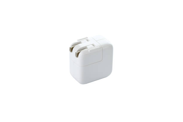 istock Close-Up a white plug adaptor for a USB cable for charge power. 1477206140