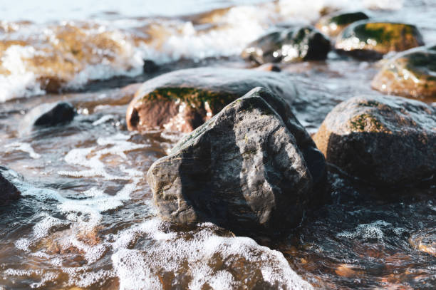 istock Big stone blocks on the beach closeup, natural minerals closeup 1477211245