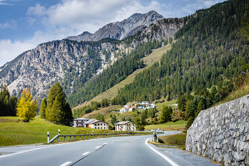 Mountain road in Alpine Landscape, Engadine Valley, Graubunden, Swiss Alps, Switzerland