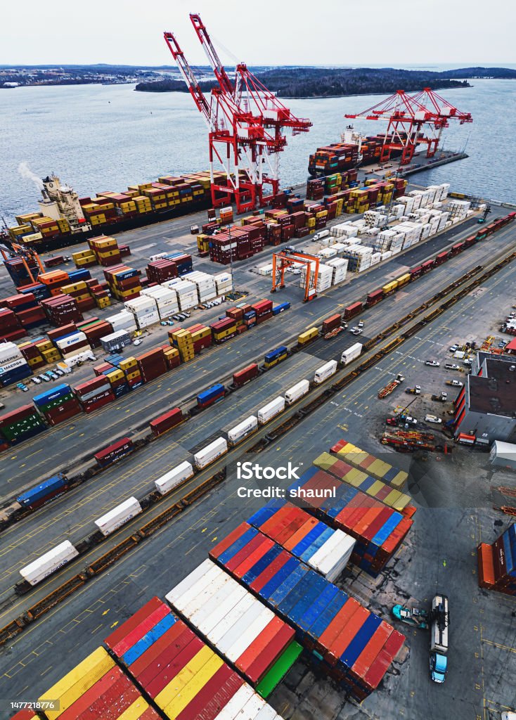 Aerial View of Container Pier Aerial drone view of a container pier with two docked ships. Canada Stock Photo