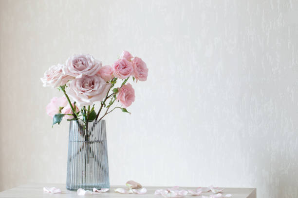istock still life with pink roses in glass vase 1477223228