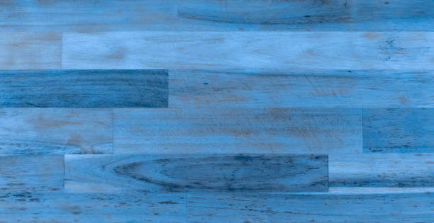 istock blue wooden background of old boards 1477227169