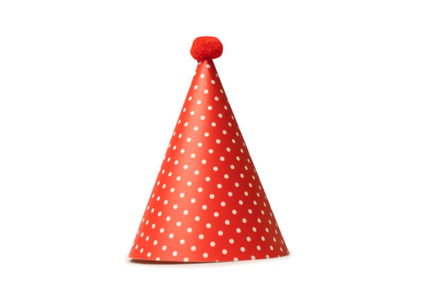 istock Bright and colorful birthday cap isolated on a white background. 1477227289