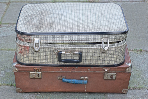 Close ups of parts of vintage suitcases.