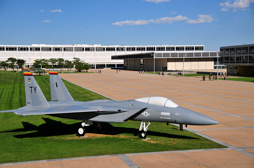 Colorado Springs, Colorado, USA: United States Air Force Academy / USAFA - McDonnell Douglas F-15A Eagle on static display, McDonnell Douglas F-4 Phantom II in the background. This 1976 model F-15 flew most of its career with the 48th Fighter Interceptor Squadron (FIS) at Langley AFB, Virginia. The jet was painted in the colors of Tyndall AFB, Florida (TY), for its last few missions. The F-15 Eagle is a twin-engine air superiority fighter manufactured by McDonnell Douglas (part of Boeing since 1997). As the classification already implies, it was designed to establish and maintain air superiority. In this role, over time it almost completely replaced the F-4 Phantom II. The F-15 has now been superseded to some extent by the F-22 Raptor.