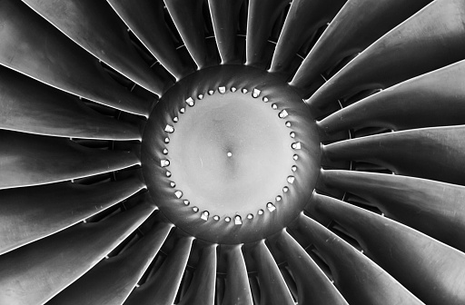 Airplane turbine with blades in a circle, close-up.