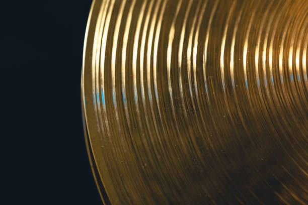 istock Drum cymbal close-up on a dark background, top view. 1477239304