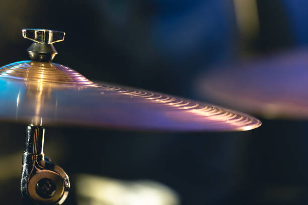 istock Drum cymbal close-up on a dark blurred background. 1477239313