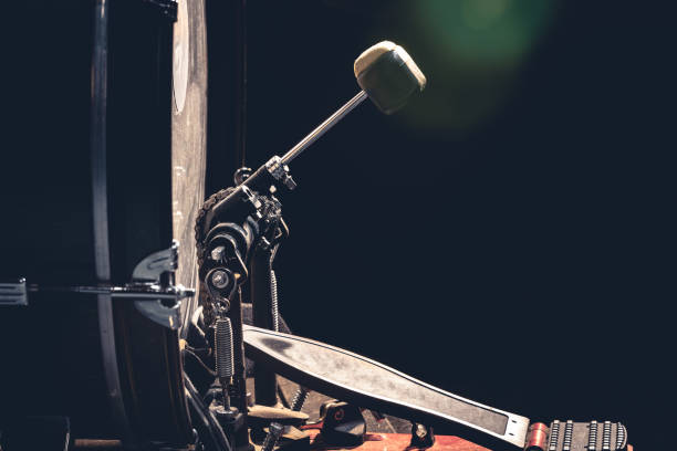 istock Bass drum with pedal, musical instrument on black background. 1477241874