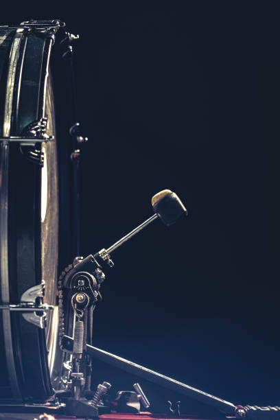 istock Bass drum with pedal, musical instrument on black background. 1477241881