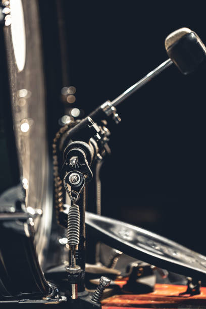 istock Bass drum with pedal, musical instrument on black background. 1477241908