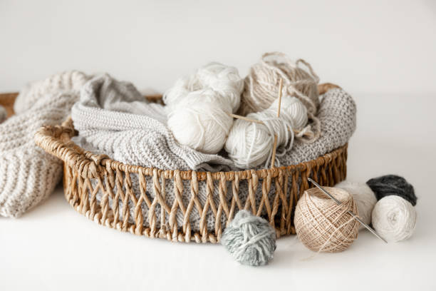 istock Basket with yarn close-up, threads for knitting. 1477243446
