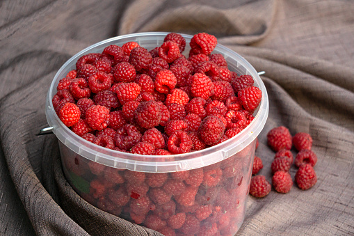 Fresh, fragrant red raspberries close-up. A beautiful harvest