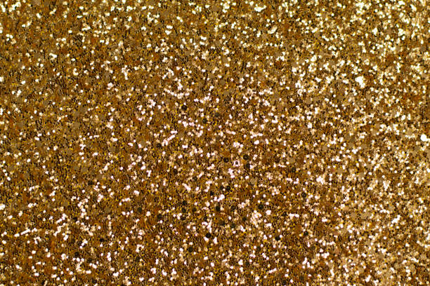 istock Abstract gold luxurious festive glamor glitter texture background sparkles 1477246642