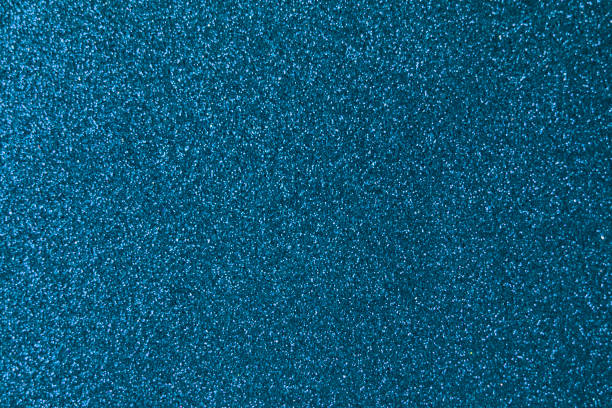 istock Abstract blue gold luxurious festive glamor glitter texture background sparkles 1477246800