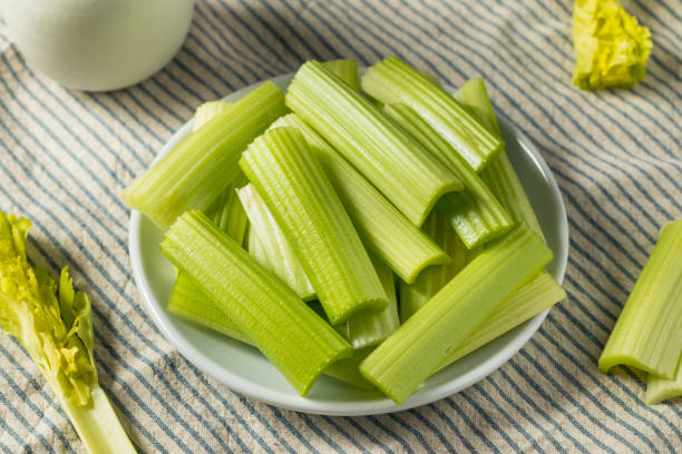 Raw Green Organic Celery Sticks stock photo