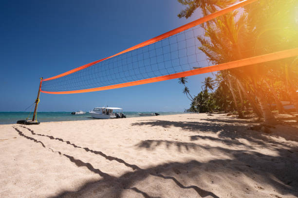 Volleyball orange net on blue sky background