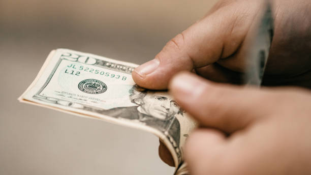 istock US dollar currency. USD inflation, US money 1477249316