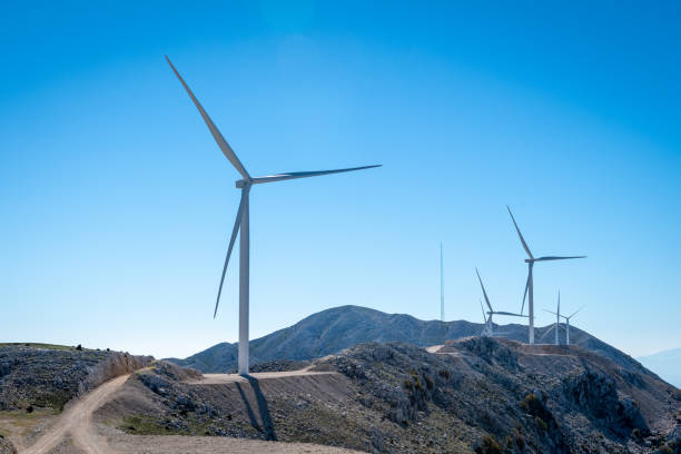 istock A mountain top wind farm. Clean, renewable energy. 1477250617