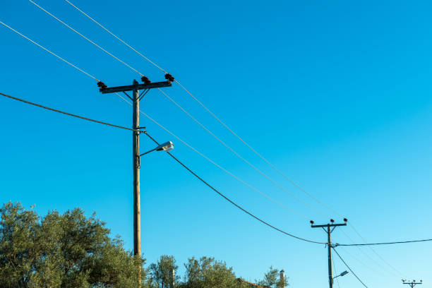 istock Overhead electricity supply transmission posts in rural areas. 1477251938