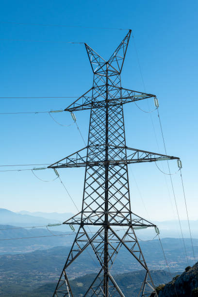 istock A electricity pylon, transmission tower. Power network. 1477251998