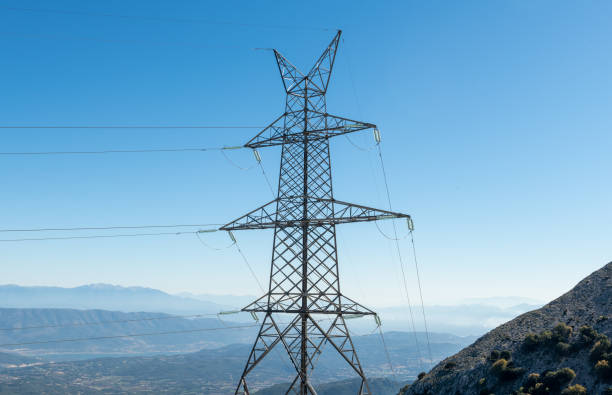 istock A electricity pylon, transmission tower. Power network. 1477252204