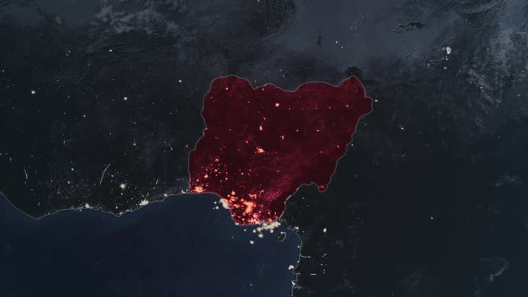 Highlighted dark map of Nigeria, zooming in from the space through a 4K photo real animated globe, with a panoramic view consisting of Africa, West Europe and USA. Epic spinning world animation, Realistic planet earth, highlight, satellite, aerial