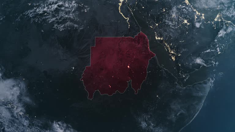 Highlighted dark map of Sudan, zooming in from the space through a 4K photo real animated globe, with a panoramic view consisting of Africa, West Europe and USA. Epic spinning world animation, Realistic planet earth, highlight, satellite, aerial