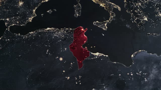 Highlighted dark map of Tunisia, zooming in from the space through a 4K photo real animated globe, with a panoramic view consisting of Africa, West Europe and USA. Epic spinning world animation, Realistic planet earth, highlight, satellite, aerial