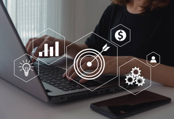 istock success and business target or goal concept, aim, project management, strategy development, dartboard and arrow and business objective target goal, marketing solution, target for business investment. 1477263634