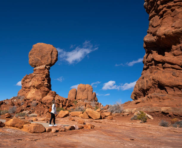 istock Girl hiking alone on vacation in Utah. 1477267312