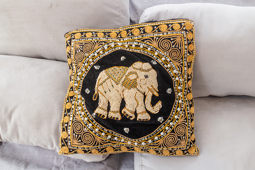 cushion with an elephant on a sofa in Rio de Janeiro, Brazil.
