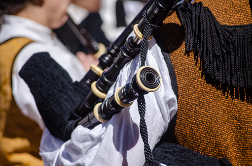 detail of a bagpipe held by a musician. Galicia, Spain.