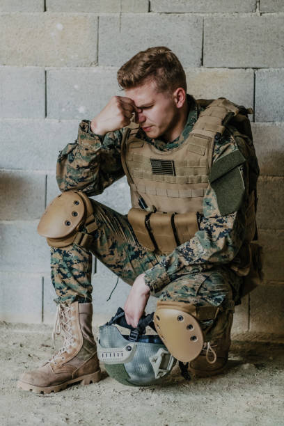 istock Psychic problems in soldiers. The soldier has psychological problems while on the battlefield 1477268000